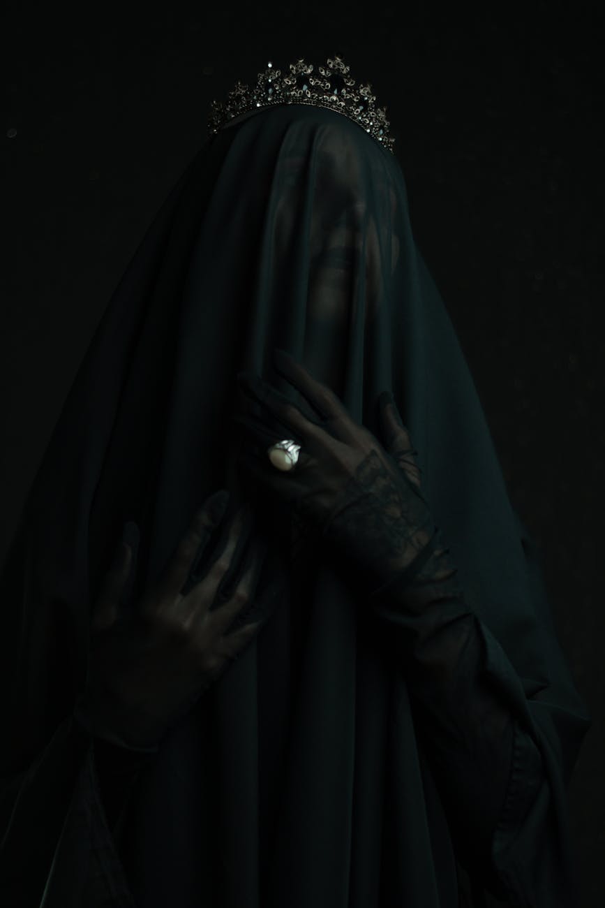 mysterious scary woman wearing veil and ring